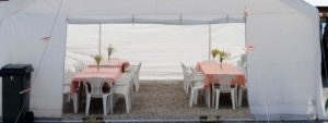 event tent with tables set up