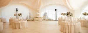 Spacious tent decorated for wedding